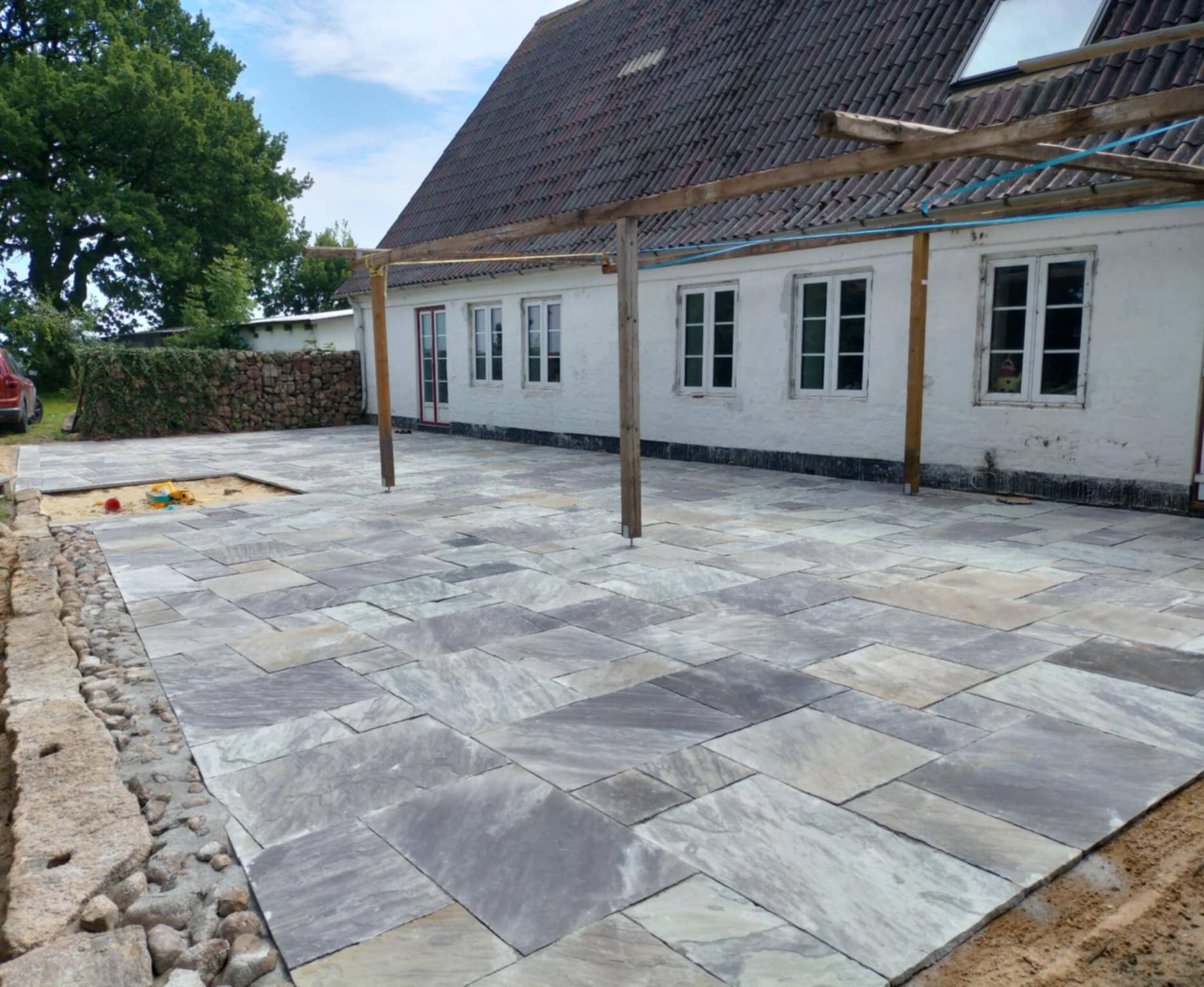 Belægning Kolding ved ældre hus